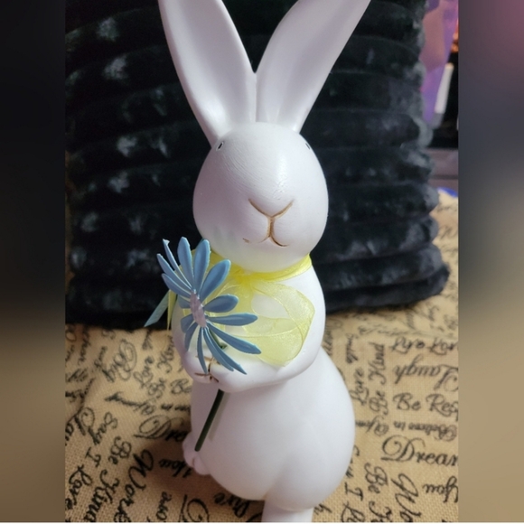 Laketown Treasures Other - Ceramic Easter bunny he's holding a blue metal flower yellow bow